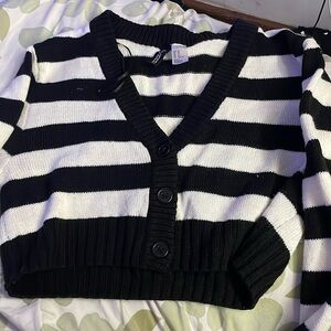 Black and white sweater is like a top style